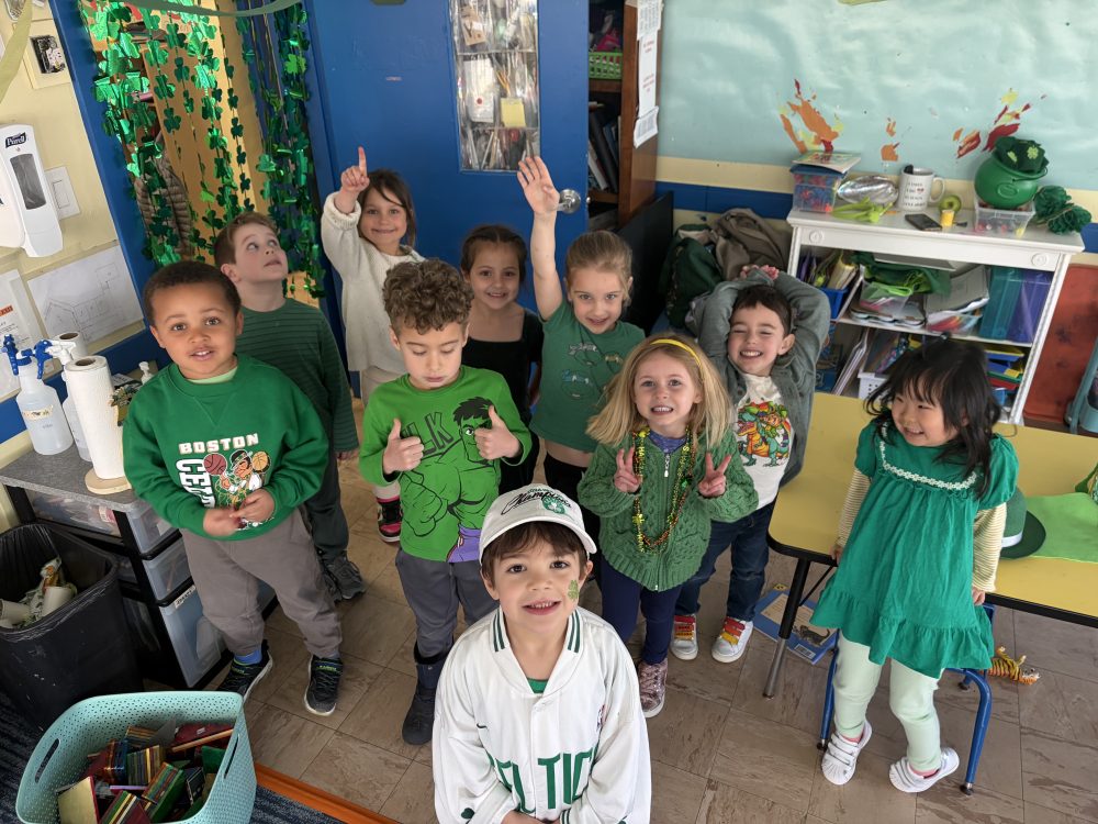 A group of children smiling at The Campbell School