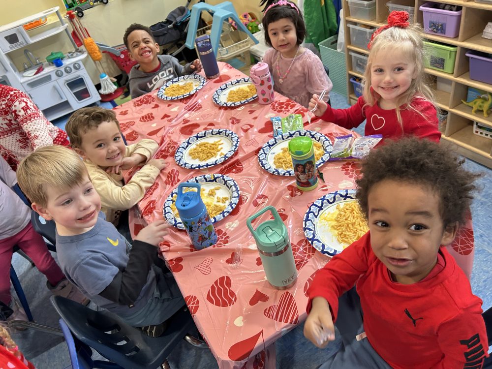 Children sharing a snack together at The Campbell School